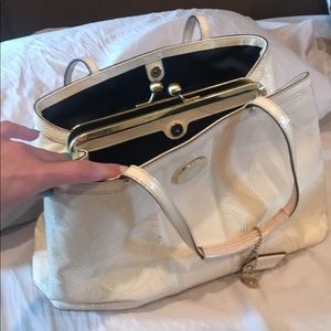 Cream Coach clutch handbag with navy lining